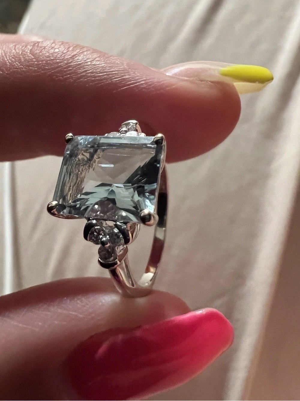 Emerald cut aquamarine cocktail styles with round diamond accents 14k white gold